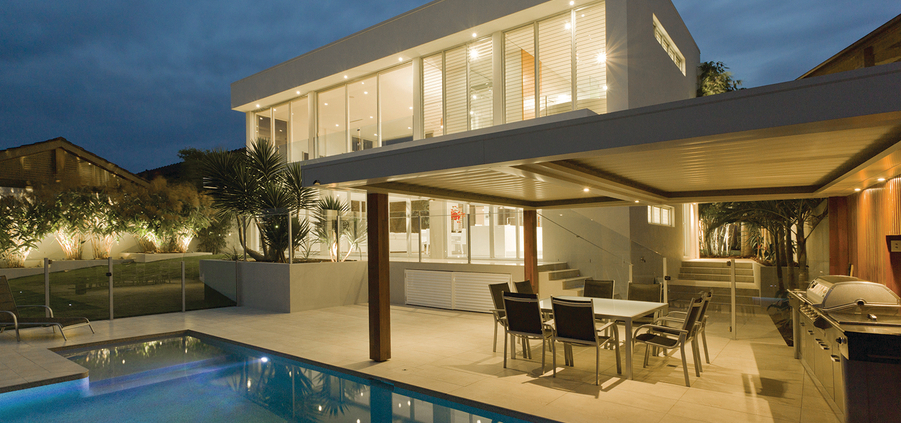 Modern backyard with pool, dining room and barbecue area